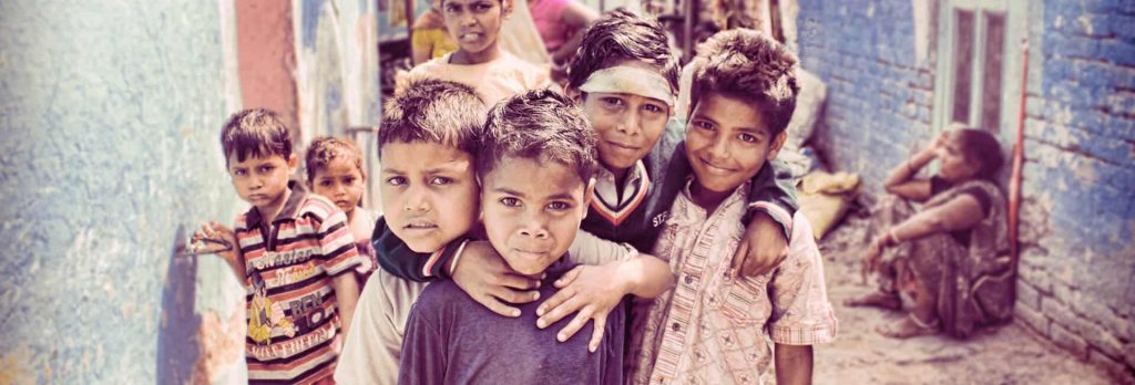 Group of children in narrow alleyway